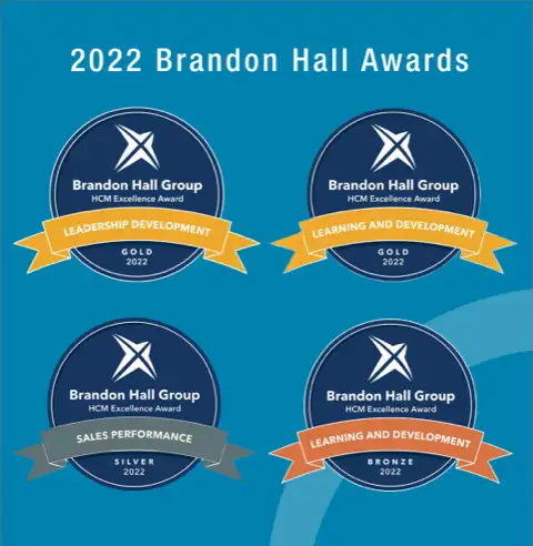 Four Brandon Hall Group 2022 awards. Two gold leadership, a silver sales, and a bronze learning and development.